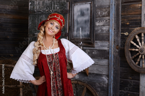 Beautiful woman portrait in russian style. Beautiful Russian girl in traditional dress. Russian style. photo