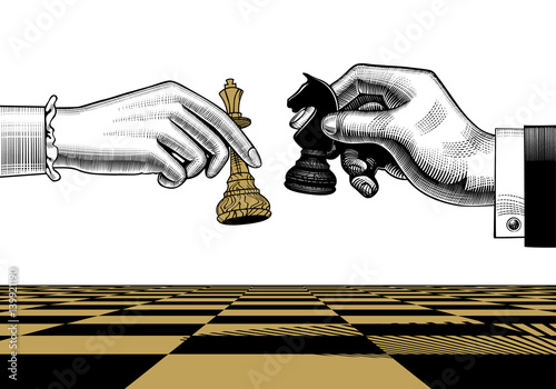 Woman's and man's hands with king and horse chess pieces