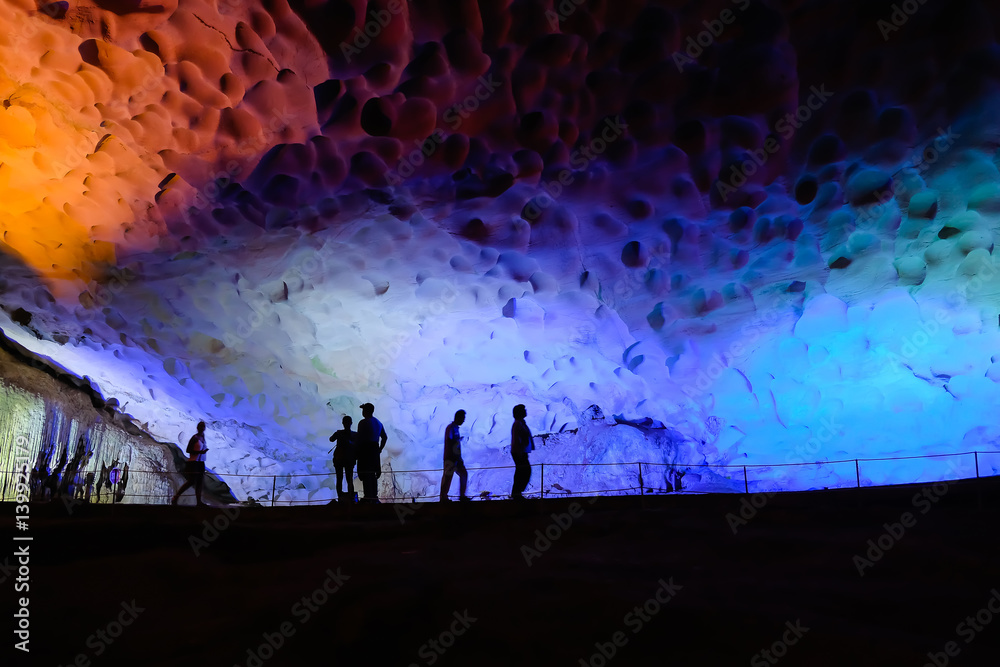 Colorful illumination in Surprise Cave in Halong Bay, Vietnam