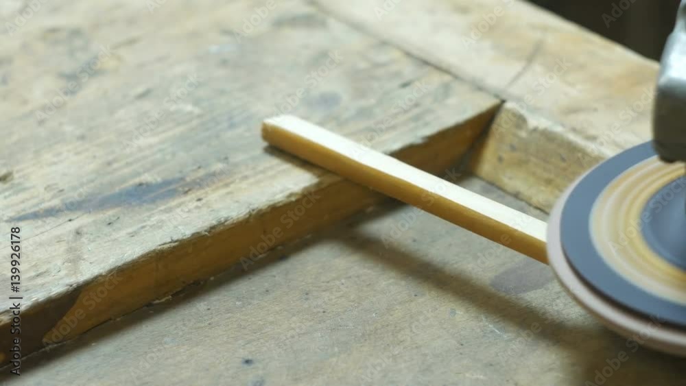 Polyshing of wooden plank by electrical tool. Polyshing of wooden plank by electrical tool.