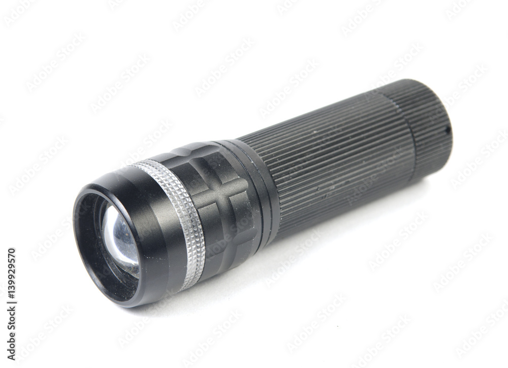 LED flashlight switched on, isolated on white LED flashlight switched on, isolated on white