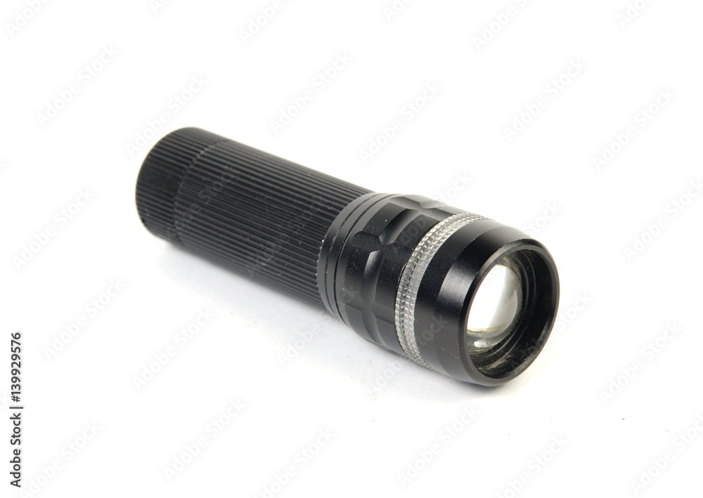 LED flashlight switched on, isolated on white LED flashlight switched on, isolated on white
