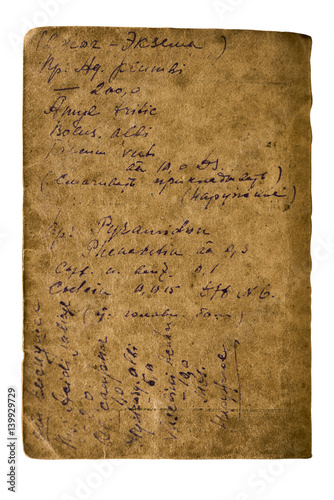 Old paper sheet with a recipe written by hand