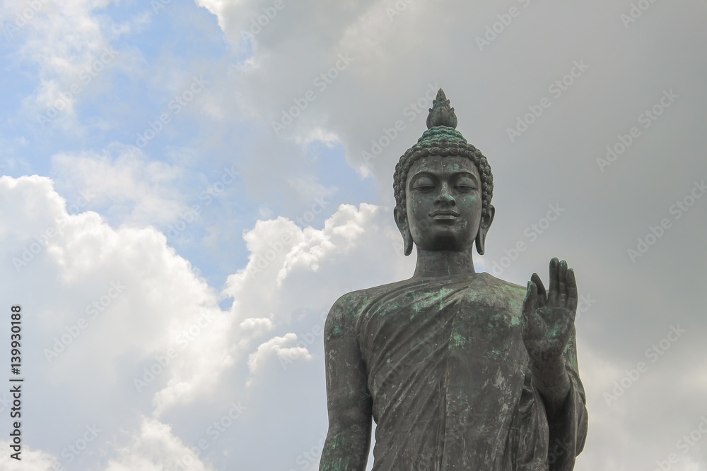 Big Buddha statue ancient on blue sky background in Nakhon Pathom Province of Thailand Big Buddha statue ancient on blue sky background in Nakhon Pathom Province of Thailand