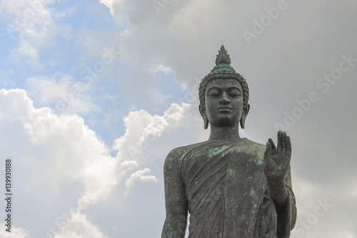 Big Buddha statue ancient on blue sky background  in Nakhon Pathom Province of Thailand