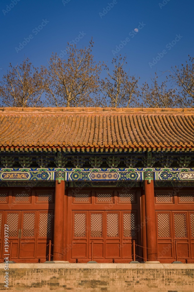 a traditional chinese red house in Imperial Ancestral Temple (Taimiao) in Beijing, China, where sacrificial ceremonies in honor of the imperial family's ancestors were held a traditional chinese red house in Imperial Ancestral Temple (Taimiao) in Beijing, China, where sacrificial ceremonies in honor of the imperial family's ancestors were held