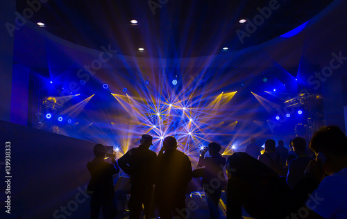 Fotografi Concert light show colorful lights in a concert stage
