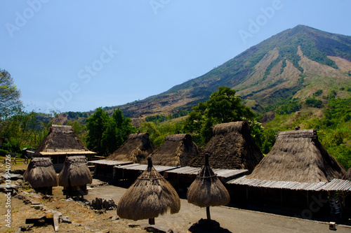Mount Inerie And Traditional Bena Village Houses in Bajawa, Indonesia photo