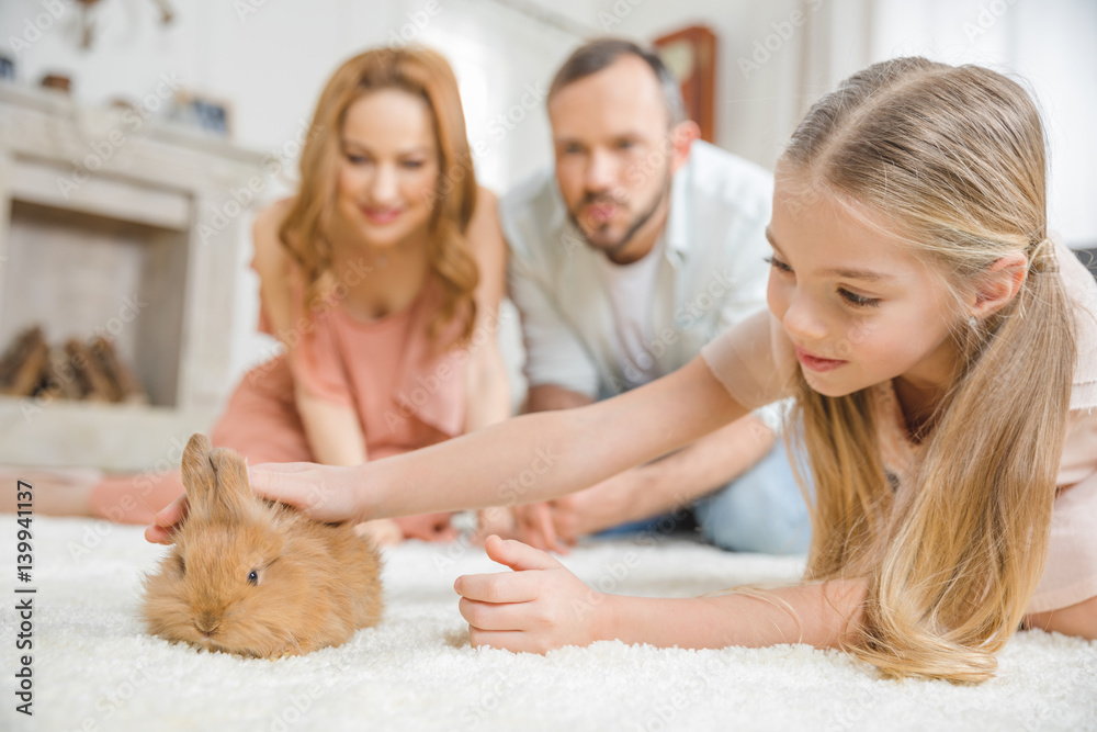 Happy family with rabbit Happy family with rabbit