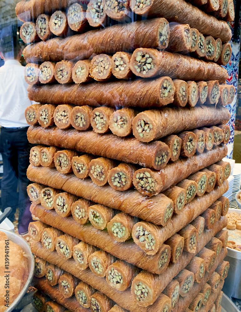 A pile of Baklava for sale in a shop window Istanbul,Turkey.