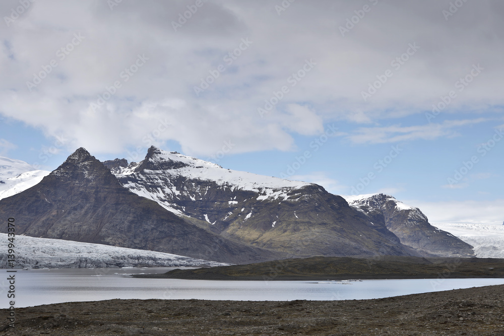 Icebergs in the glacial lake, Fjallsarlon lagoon, south Iceland Icebergs in the glacial lake, Fjallsarlon lagoon, south Iceland