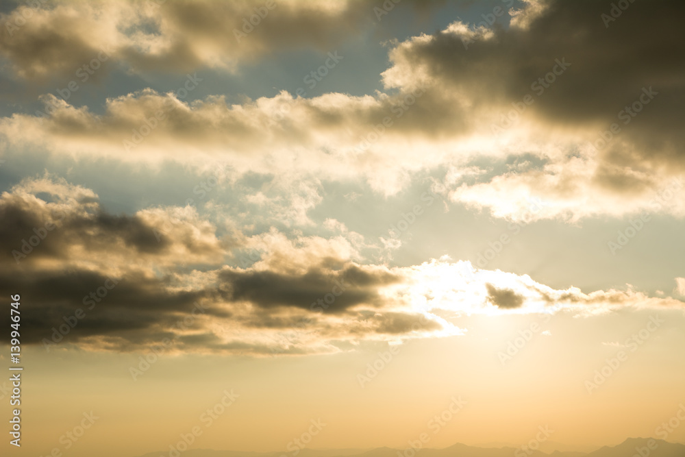 The cloudy sky in evening,Golden light background