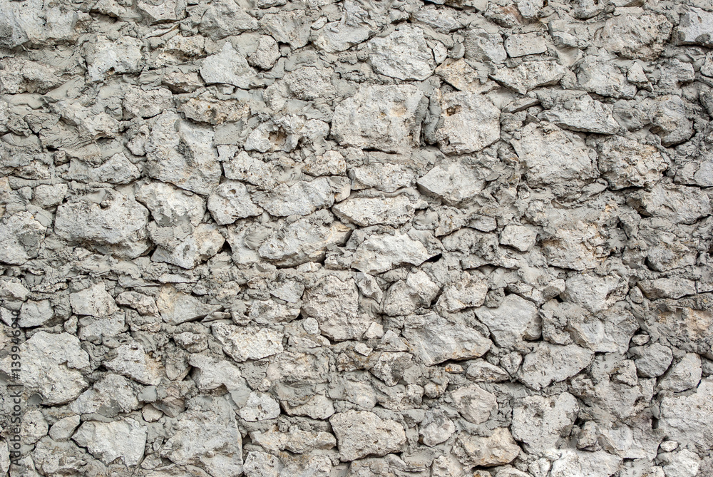 Molded concrete wall with white limestone stone Molded concrete wall with white limestone stone