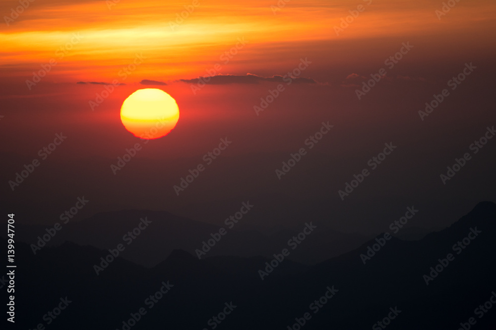 Sunset at the Mountain Hill,Beautiful sunlight, Golden lights background