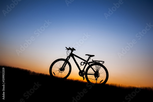 The silhouette of mountain bike