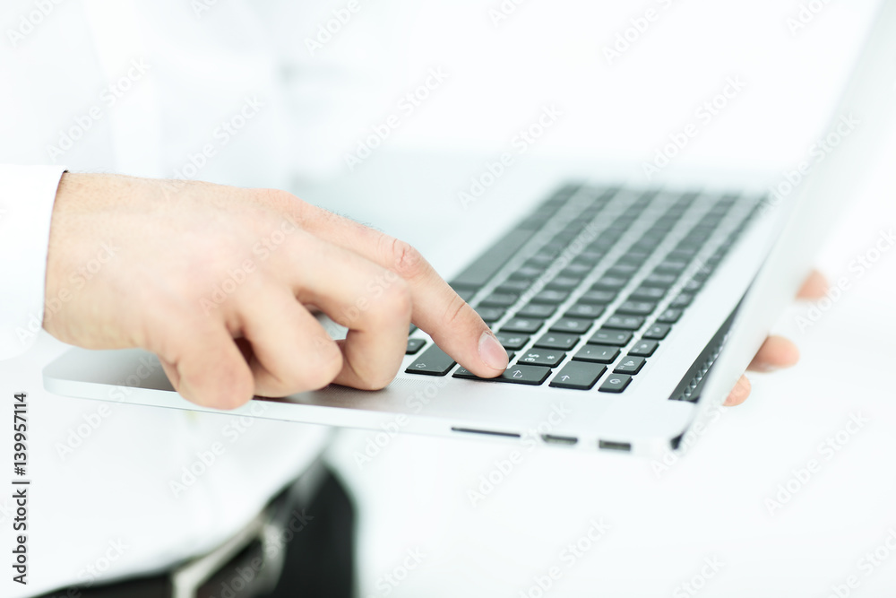 Hand of businessman on keyboard Hand of businessman on keyboard