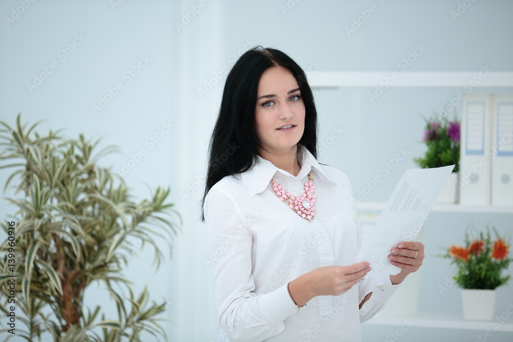 Portrait of a young businesswoman in modern office Portrait of a young businesswoman in modern office