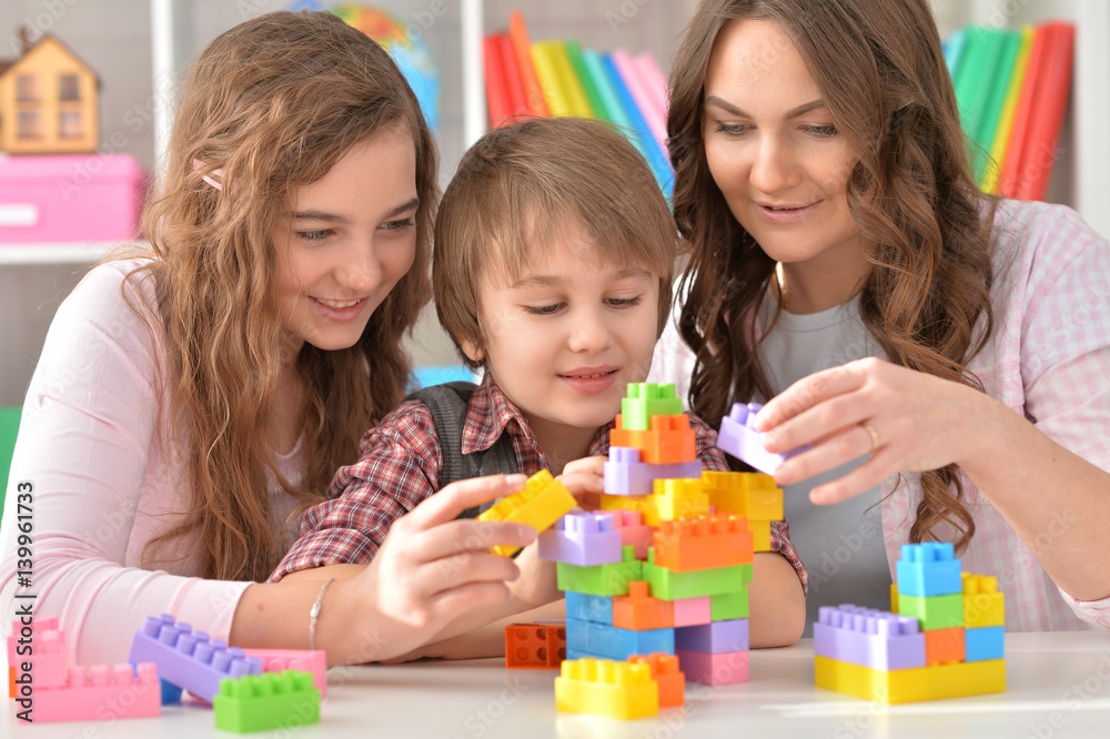 Family playing Bricks game Family playing Bricks game