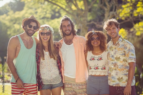 Group of friends having fun together in park