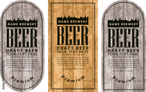 template vector beer label with the old town on wooden background