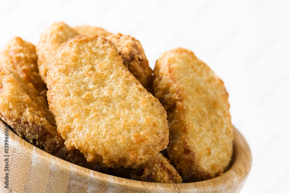 Fried chicken nuggets in bowl isolated on white background
Fried chicken nuggets in bowl isolated on white background