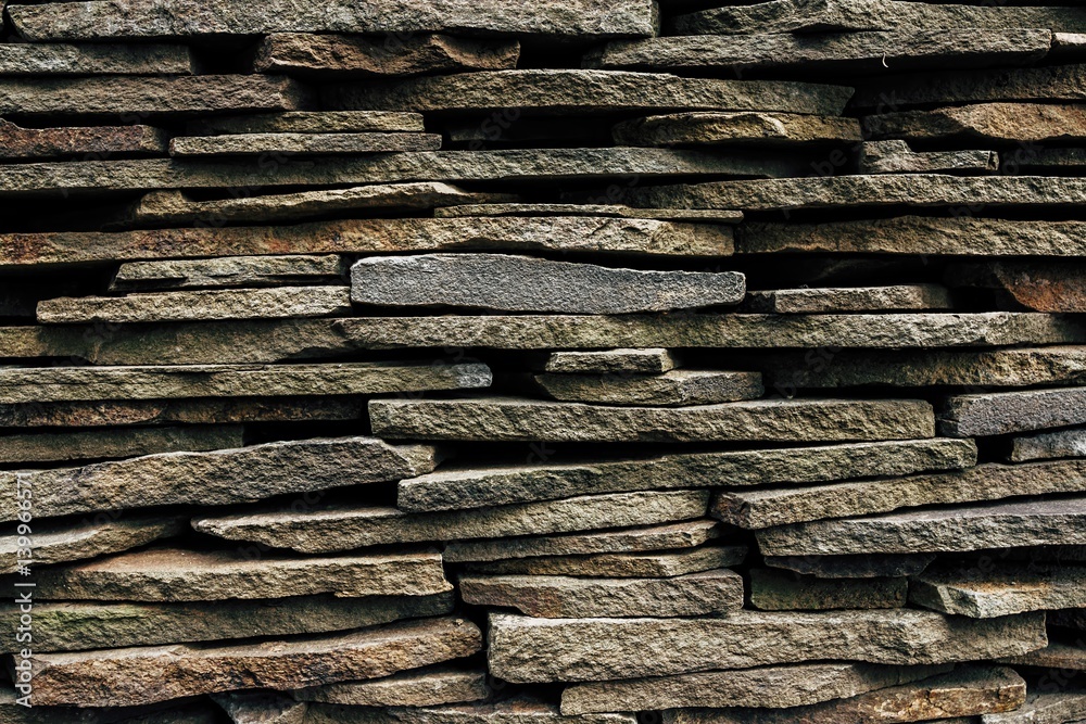 Stone wall. Outdoor background natural stone. Macro shot. Stone wall. Outdoor background natural stone. Macro shot.