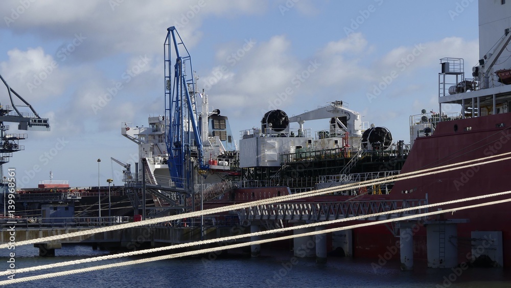 Details of loading arms on shore/ship side on board Tanker ship in operations at Oil Terminal Details of loading arms on shore/ship side on board Tanker ship in operations at Oil Terminal