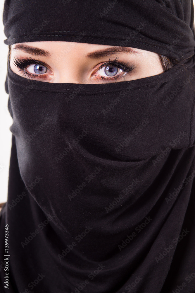 Portrait of a woman wearing a mask. Portrait of a woman wearing a mask.