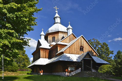 Fototapeta Naklejka Na Ścianę i Meble -  ancient greek catholic wooden church in Hoszow near Ustrzyki Dolne