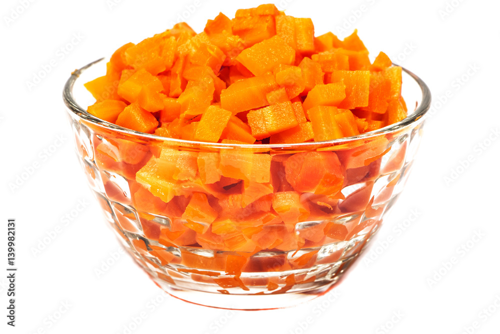 Carrot cubes in a vase on a white background Carrot cubes in a vase on a white background