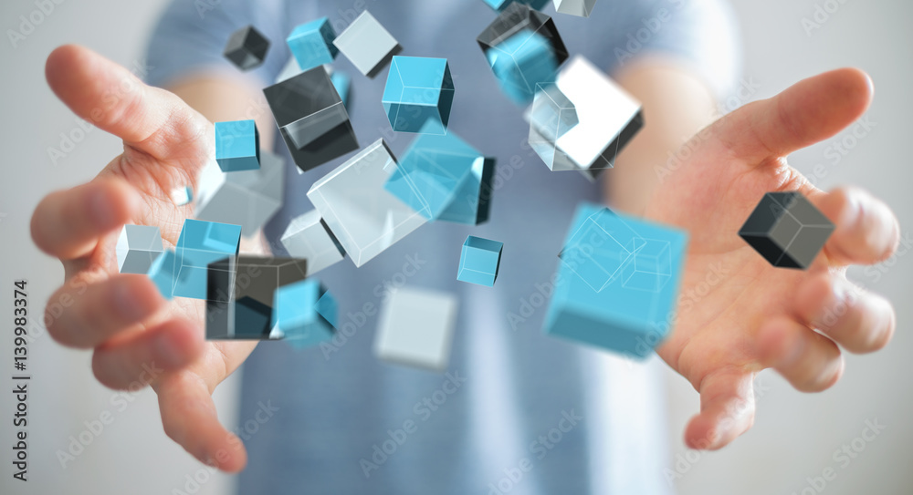 Businessman holding floating blue shiny cube network 3D rendering Businessman holding floating blue shiny cube network 3D rendering
