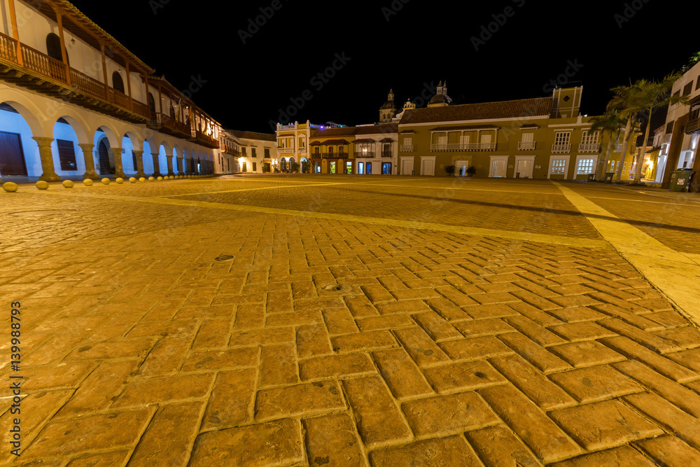 The Plaza de la Aduana at night in Cartagena, Colombia.