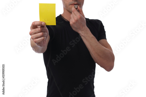 Referee showing yellow card. Business and sport concept. Exclusion