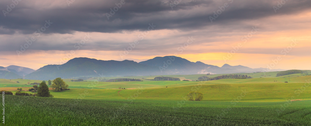 Fototapeta premium Summer sunset in mountain valley