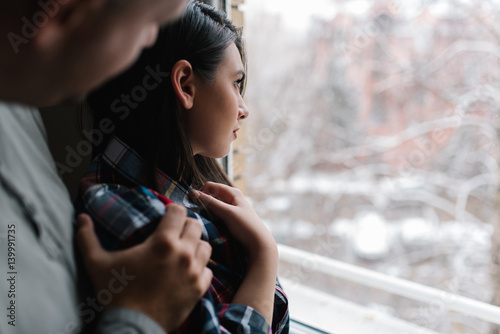 Wall Mural Comforting her insecurities