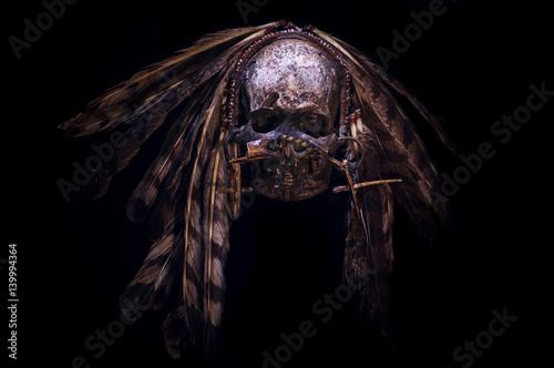 Fotografie Old Papuan Decorated Tribal Skull