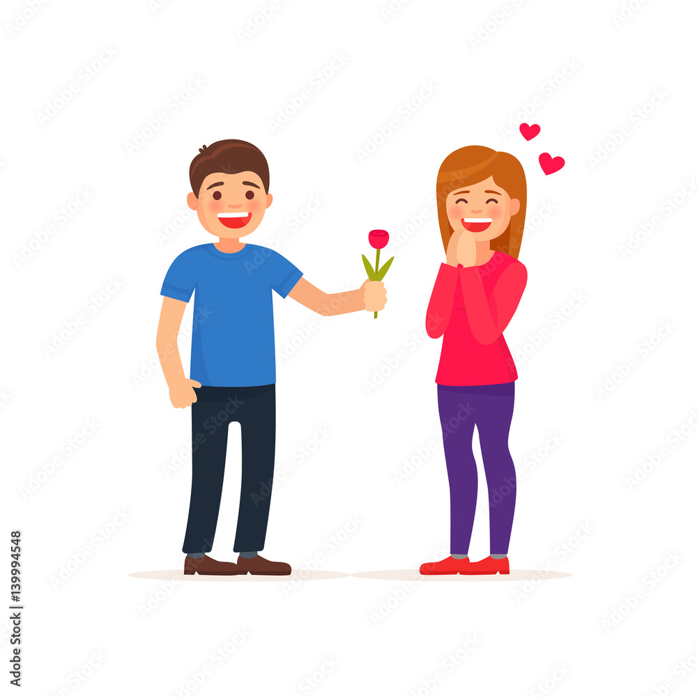Man gives a woman a bouquet of flower and gift. Happy March 8. Man gives a woman a bouquet of flower and gift. Happy March 8.