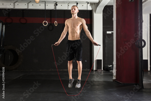 Man With Jumping Rope In The Gym