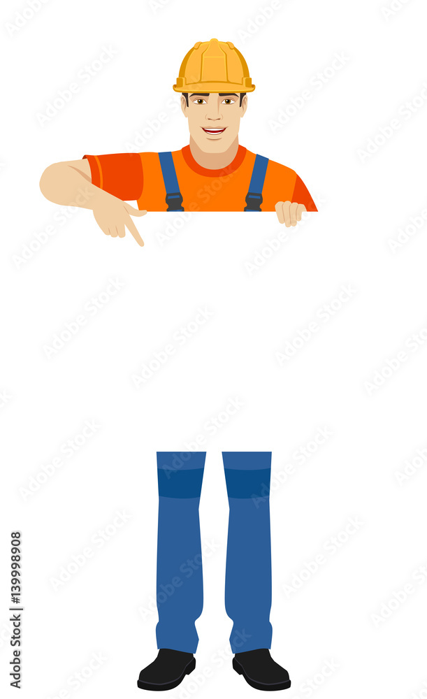 Builder pointing at white blank poster Builder pointing at white blank poster