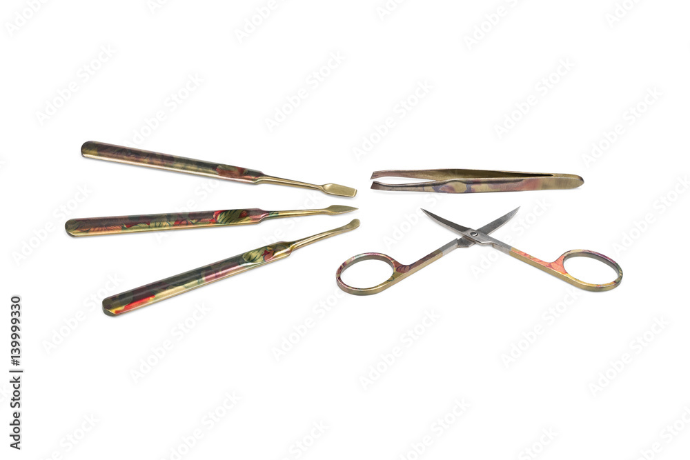 Beautiful decorative set manicure instruments isolated on white background Beautiful decorative set manicure instruments isolated on white background