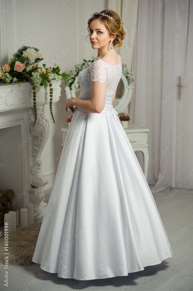 Beautiful bride before wedding ceremony in appartament Beautiful bride before wedding ceremony in appartament