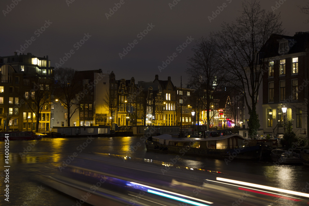 Night view Amsterdam with light trail