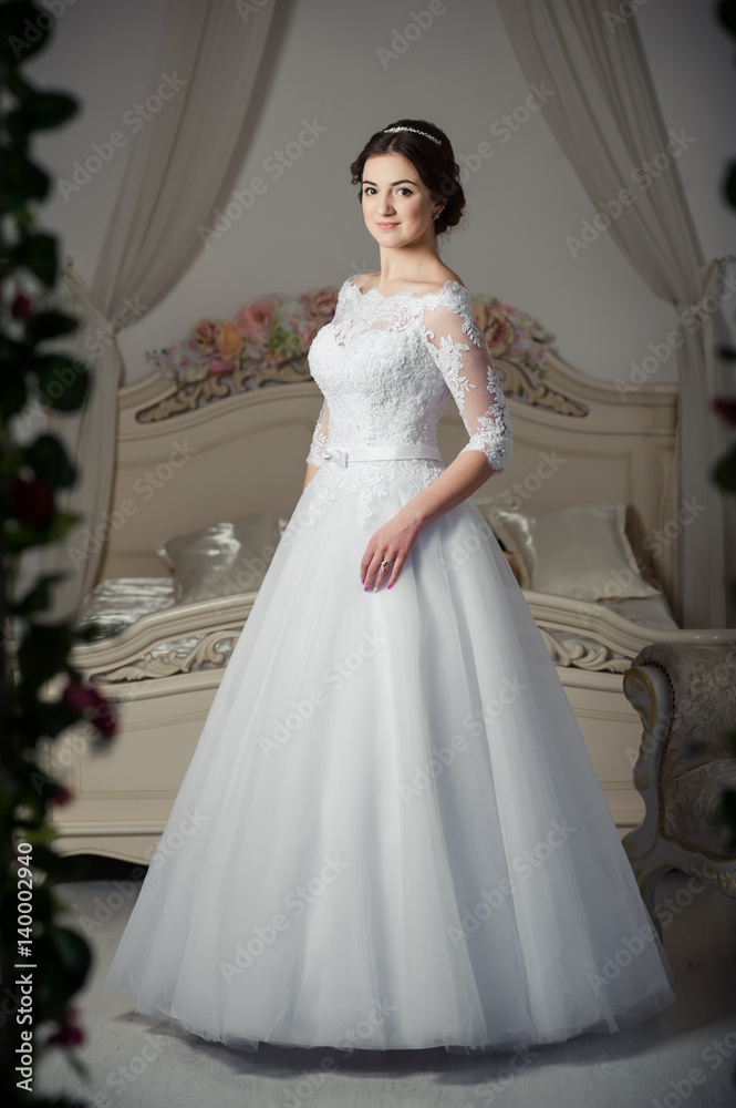Fototapeta premium Beautiful bride before wedding ceremony in appartament