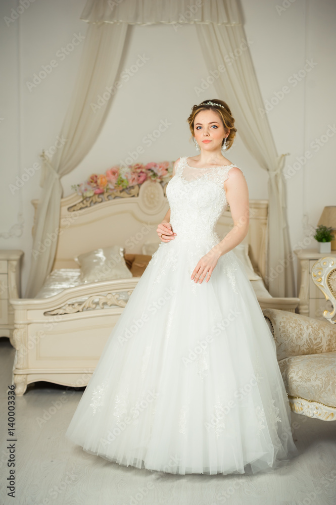 Beautiful bride before wedding ceremony in appartament Beautiful bride before wedding ceremony in appartament