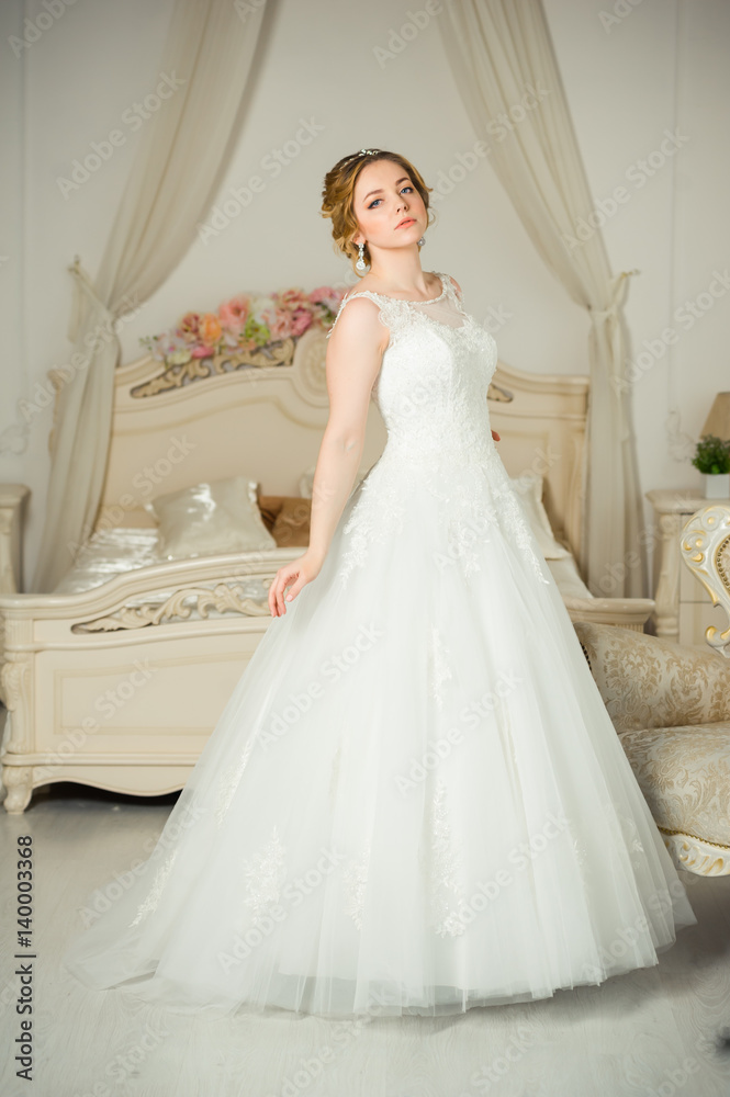 Beautiful bride before wedding ceremony in appartament Beautiful bride before wedding ceremony in appartament