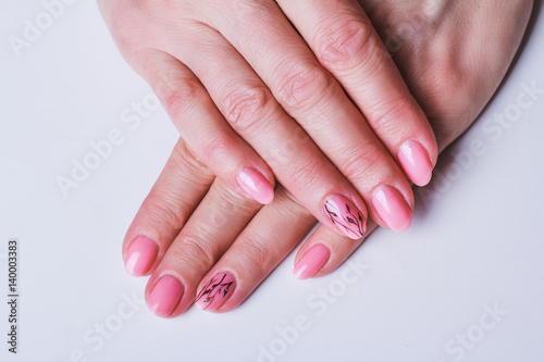 Pink nail art with flowers