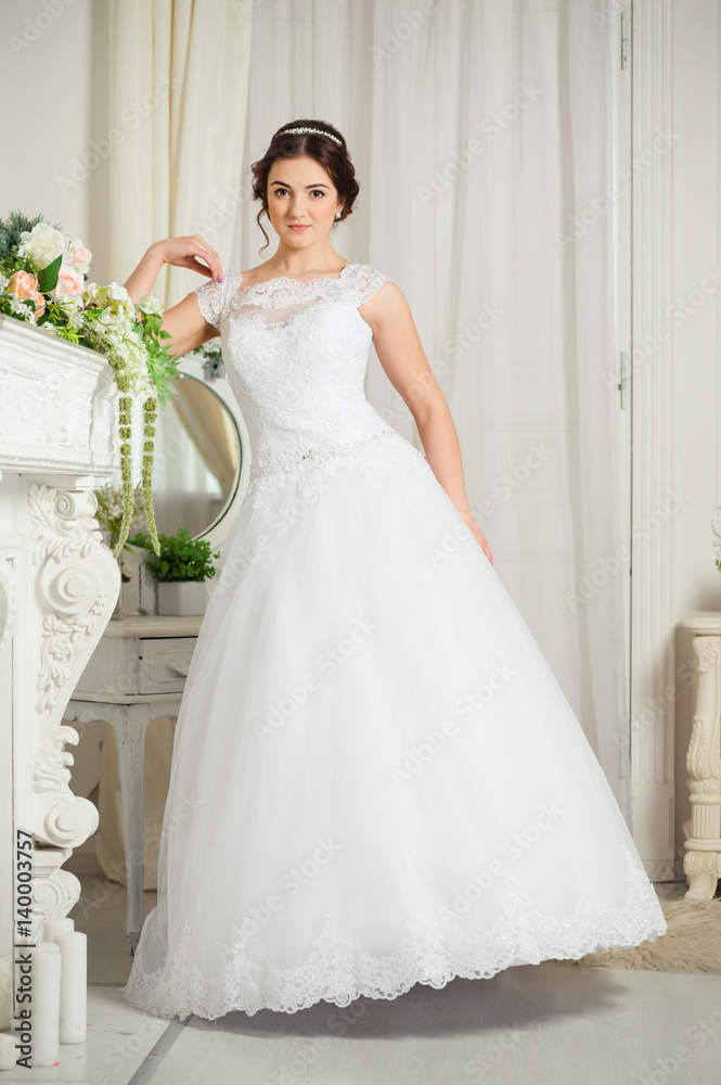 Beautiful bride before wedding ceremony in appartament Beautiful bride before wedding ceremony in appartament