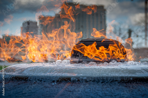 The centennial flame  is a fire and water eternal flame that burns in front of Canada's Parliament Building on Parliament Hill. photo