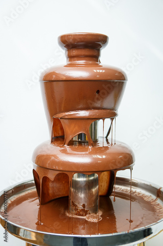 Fondue with chocolate fountain close-up