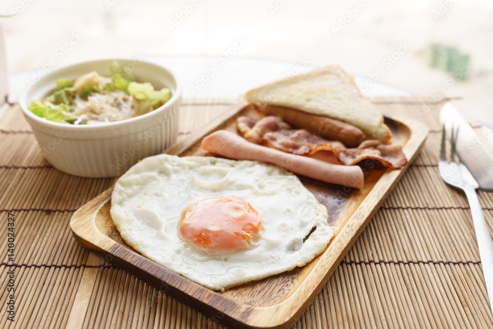 american breakfast beautiful fried egg on wood dish with vegetable salad american breakfast beautiful fried egg on wood dish with vegetable salad